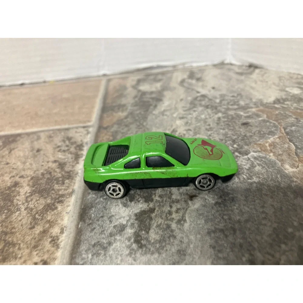 Green Race Car Toy Model Number 12 with Fox Logo‎